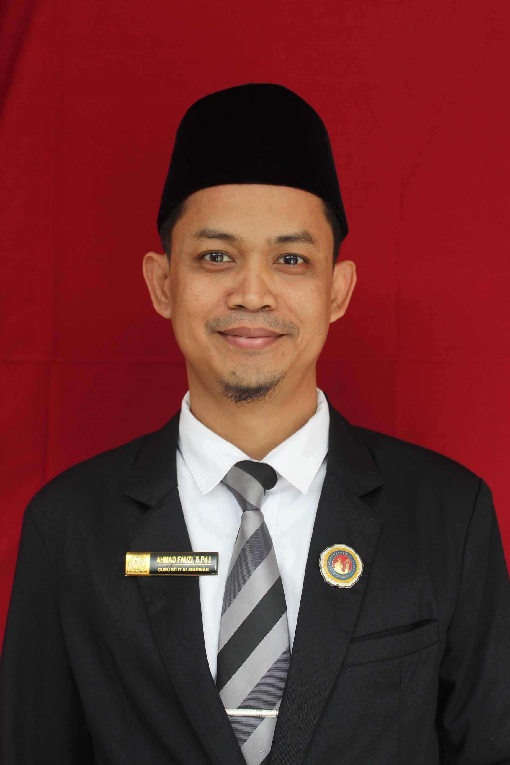 Ahmad Fauzi, S.Pd