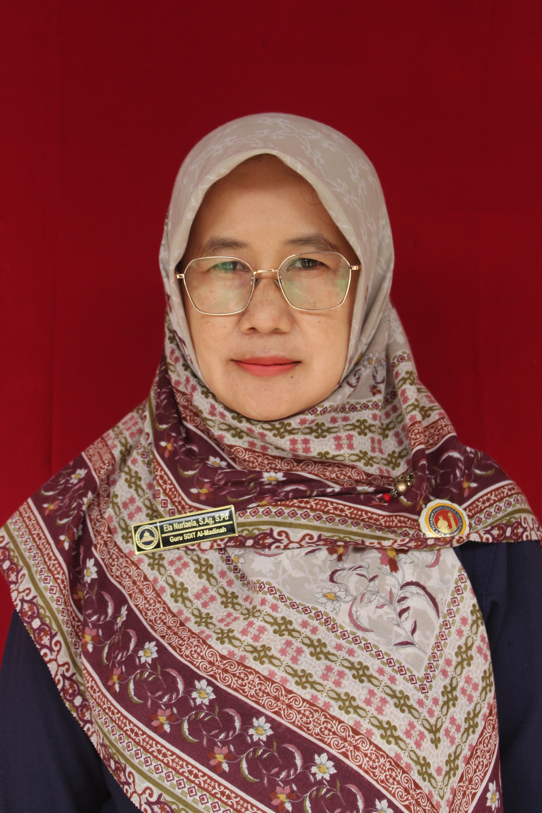 Ela Nurlaela, S.Ag, S.Pd