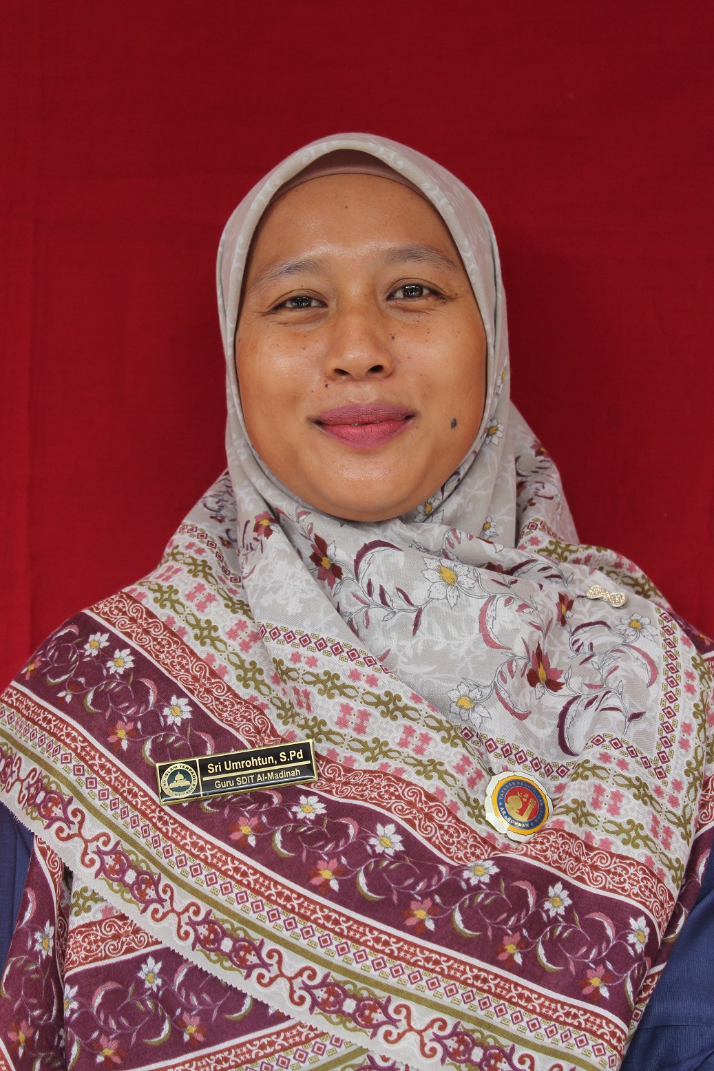 Sri Umrohtun, S.Pd