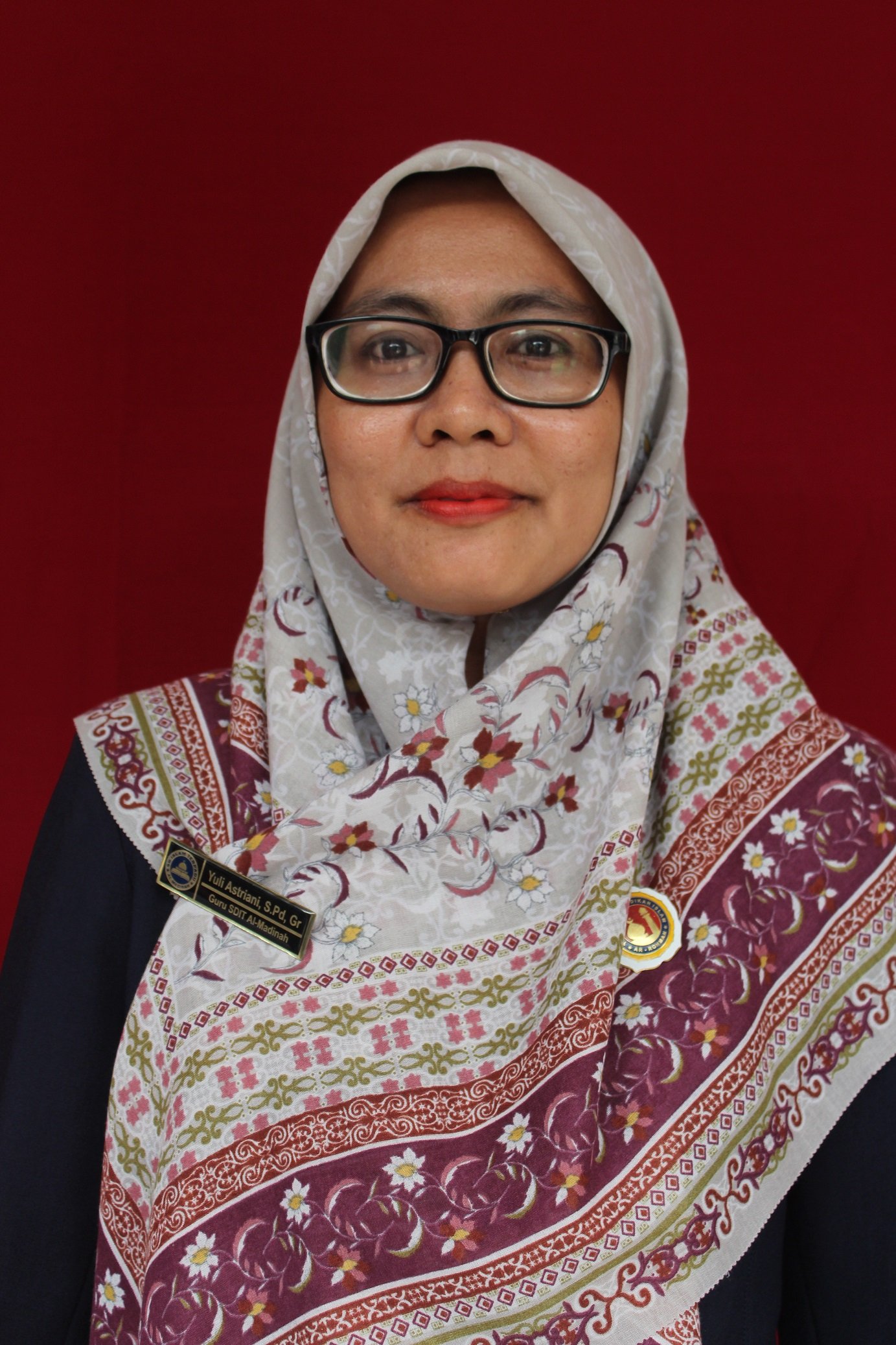 Yuli Astriani, S.Pd, Gr