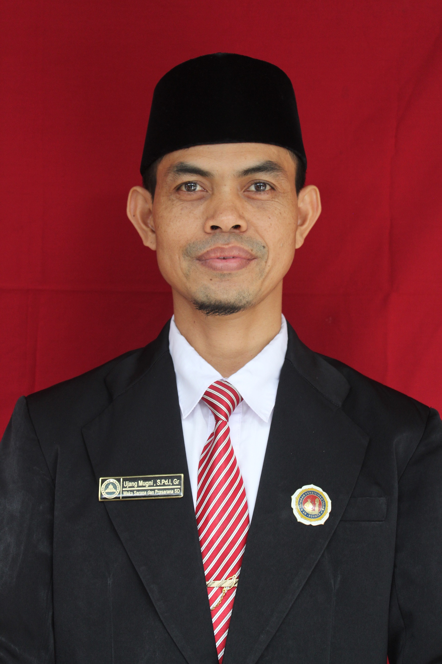 Ujang Mugni , S.Pd.I, Gr