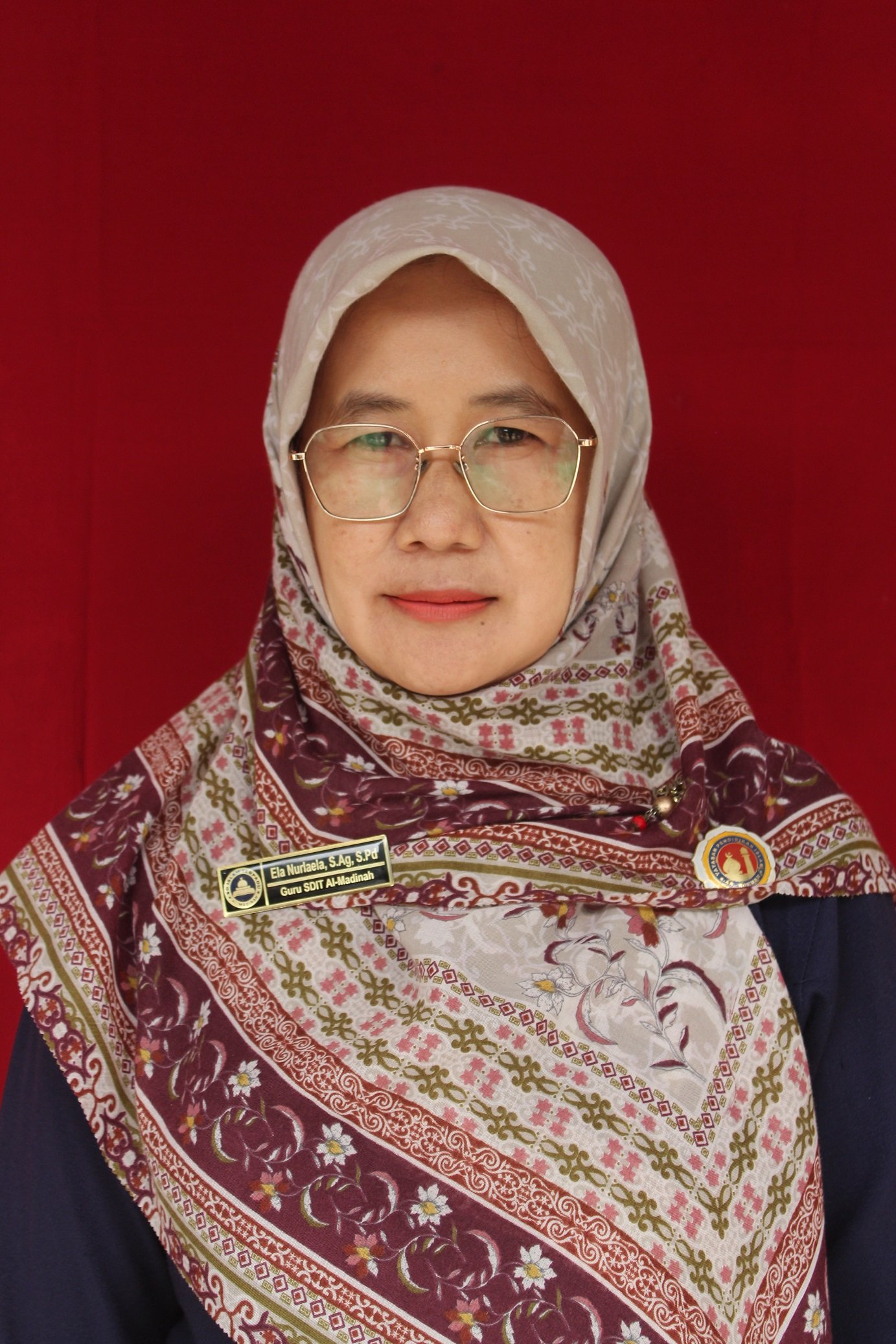 Ela Nurlela, S.Ag, S.Pd