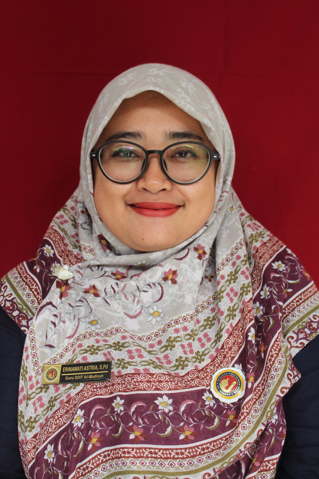 Erinawati Astria, S. Pd, Gr.